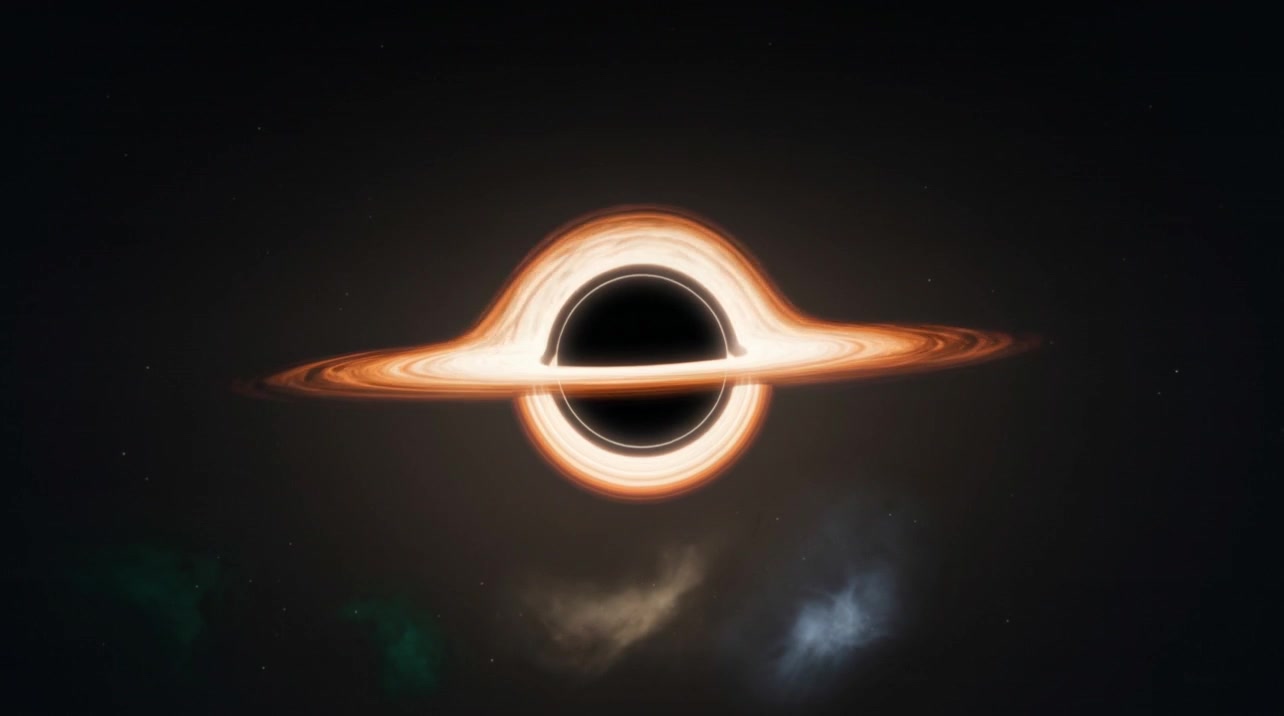 A black hole with a glowing orange accretion disk, settled in calm dark space